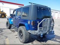 2009 Jeep Wrangler Unlimited — photo 3 of 15 | VIN 1J4GA59119L718084