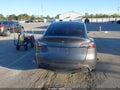 2022 Tesla Model Y — photo 16 of 19 | VIN 7SAYGDEE7NF461279