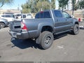 2010 Toyota Tacoma — photo 4 of 17 | VIN 3TMJU4GN8AM096900