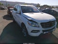 2014 Mercedes-Benz ML-Class — photo 13 of 16 | VIN 4JGDA5HB1EA373594