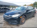 2018 Honda Civic — photo 2 of 16 | VIN 19XFC2E53JE032838