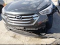 2013 Hyundai Santa Fe — photo 17 of 17 | VIN 5XYZU3LB4DG111662