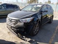 2013 Hyundai Santa Fe — photo 2 of 17 | VIN 5XYZU3LB4DG111662