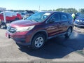 2015 Honda CR-V — photo 2 of 16 | VIN 2HKRM3H37FH505217