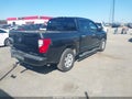 2018 Nissan Titan — photo 4 of 20 | VIN 1N6AA1E50JN505453