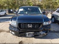 2014 Honda Ridgeline — photo 12 of 20 | VIN 5FPYK1F63EB005790