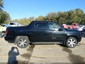 2014 Honda Ridgeline — photo 13 of 20 | VIN 5FPYK1F63EB005790