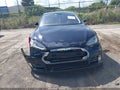 2014 Tesla Model S — photo 12 of 22 | VIN 5YJSA1H16EFP35311