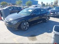 2017 Honda Civic — photo 2 of 16 | VIN 19XFC1F37HE213524