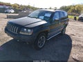 2000 Jeep Cherokee — photo 2 of 11 | VIN 1J4FF48S1YL257145