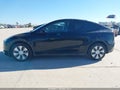 2023 Tesla Model Y — photo 14 of 18 | VIN 7SAYGDEE8PA111384