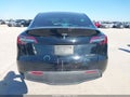 2023 Tesla Model Y — photo 16 of 18 | VIN 7SAYGDEE8PA111384