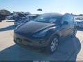 2023 Tesla Model Y — photo 2 of 18 | VIN 7SAYGDEE8PA111384