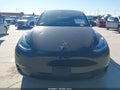 2023 Tesla Model Y — photo 6 of 18 | VIN 7SAYGDEE8PA111384