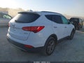 2014 Hyundai Santa Fe — photo 4 of 11 | VIN 5XYZU3LB4EG128205