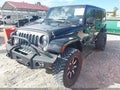 2015 Jeep Wrangler Unlimited — photo 2 of 16 | VIN 1C4BJWDG8FL561408