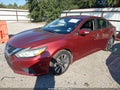 2016 Nissan Altima — photo 2 of 12 | VIN 1N4AL3AP8GC117865