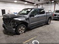 2023 Ford F-150 Lightning — photo 2 of 21 | VIN 1FTVW1ELXPWG32802