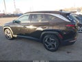 2022 Hyundai Tucson Hybrid — photo 14 of 16 | VIN KM8JECA19NU029779
