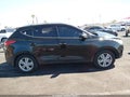 2012 Hyundai Tucson — photo 13 of 16 | VIN KM8JU3AC0CU324433