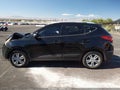 2012 Hyundai Tucson — photo 14 of 16 | VIN KM8JU3AC0CU324433