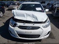 2015 Hyundai Accent — photo 12 of 16 | VIN KMHCT4AE0FU930631