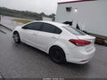 2017 Kia Forte — photo 3 of 11 | VIN 3KPFL4A79HE018469
