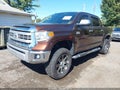 2014 Toyota Tundra — photo 2 of 16 | VIN 5TFAY5F15EX388612