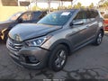 2018 Hyundai Santa Fe — photo 2 of 16 | VIN 5NMZTDLB2JH080034