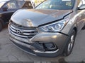 2018 Hyundai Santa Fe — photo 6 of 16 | VIN 5NMZTDLB2JH080034