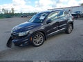 2016 Volkswagen Tiguan — photo 2 of 17 | VIN WVGBV7AX7GW589081
