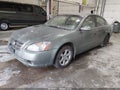 2002 Nissan Altima — photo 2 of 13 | VIN 1N4AL11D52C109841