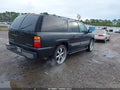2003 Chevrolet Suburban 1500 — photo 4 of 11 | VIN 3GNEC16Z03G292717