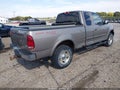 2001 Ford F-150 — photo 4 of 11 | VIN 1FTRX18L51NA63817