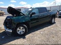 2015 Chevrolet Silverado 1500 — photo 2 of 17 | VIN 3GCUKREC3FG137229
