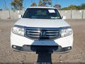 2012 Honda Pilot — photo 12 of 16 | VIN 5FNYF4H55CB075422