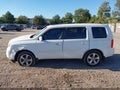 2012 Honda Pilot — photo 14 of 16 | VIN 5FNYF4H55CB075422