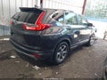 2019 Honda CR-V — photo 4 of 17 | VIN 5J6RW1H8XKA031611