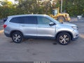 2016 Honda Pilot — photo 13 of 16 | VIN 5FNYF6H74GB102905