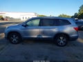 2016 Honda Pilot — photo 14 of 16 | VIN 5FNYF6H74GB102905