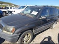 2004 Jeep Grand Cherokee — photo 2 of 11 | VIN 1J4GW48S14C245592