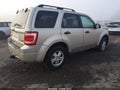 2011 Ford Escape — photo 4 of 13 | VIN 1FMCU9DG9BKB09153