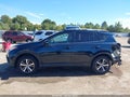 2017 Toyota RAV4 — photo 15 of 18 | VIN JTMRFREV4HJ714511
