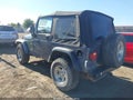 2002 Jeep Wrangler — photo 3 of 11 | VIN 1J4FA49S82P709248