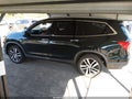 2017 Honda Pilot — photo 15 of 17 | VIN 5FNYF6H00HB014101