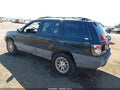 1999 Jeep Grand Cherokee — photo 3 of 11 | VIN 1J4GW58S6XC571026