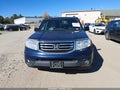 2013 Honda Pilot — photo 12 of 16 | VIN 5FNYF4H59DB054543