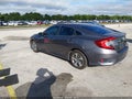 2018 Honda Civic — photo 3 of 17 | VIN 2HGFC2F54JH574096