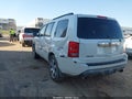 2012 Honda Pilot — photo 3 of 16 | VIN 5FNYF3H99CB009176