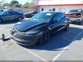 2025 Tesla Model 3 — photo 2 of 16 | VIN 5YJ3E1EA5SF031741